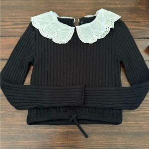 Black Ribbed Sweater with White Collar